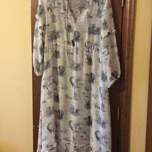 Long sleeve, maxi, flows, loose, very light.